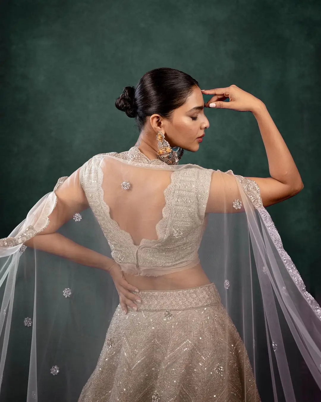 Teledu Actress Aishwarya Lekshmi in White Lehenga Choli